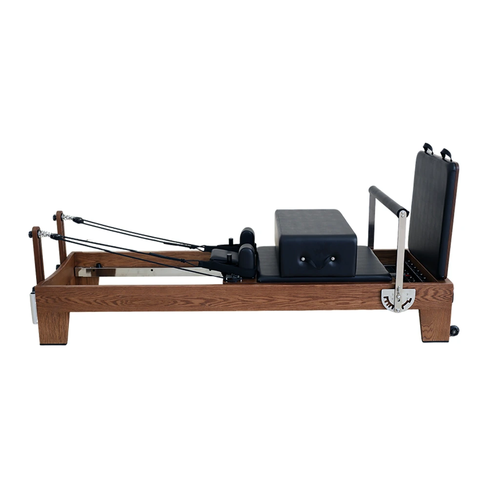 SourcePro Walnut Wood Reformer detail photo 1 — Solid Hardwood construction close-up