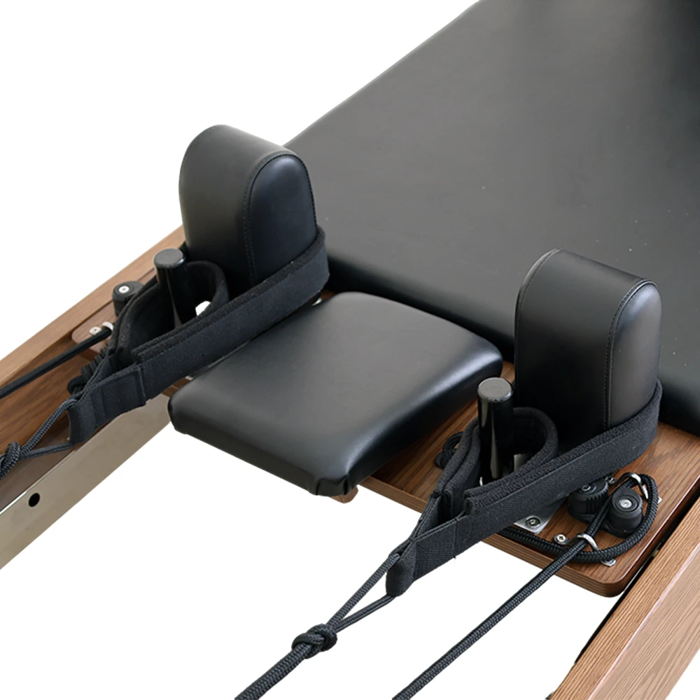 SourcePro Walnut Wood Reformer detail photo 3 — Solid Hardwood construction close-up